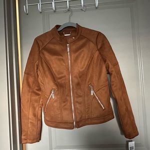 Faux suede tan. Interior lining.